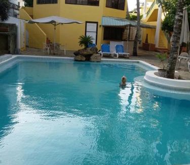 El Batey Apartment | Two-bedroom apartment with a pool near the city center