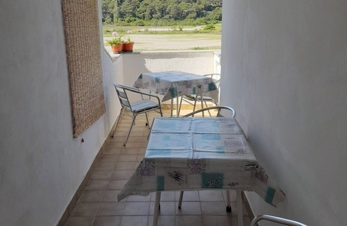 Suha Punta Apartment | Two bedroom apartment with terrace and sea view Kampor, Rab (A-4984-a)