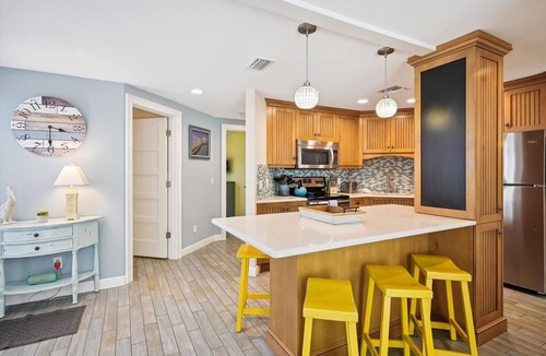 Holmes Beach Cottage | Two Bedroom Ground Floor Island Home Sleeps 5 and Includes Heated Pool.