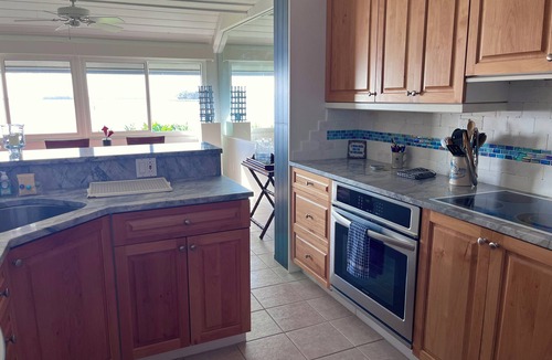 Moorings Condo | two bedroom plus denture full bath, wide river views in Vero Beach