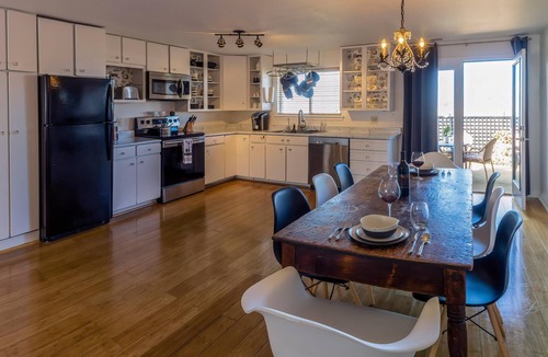 Talent Apartment | Two cottages with king bed bedrooms, dining area and full kitchen.