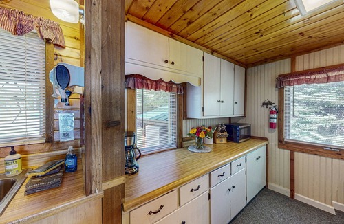 Eagle River House | Two cozy, lakefront cottages w/2 docks, a patio, firepit, 2 gas grills, & WIFI