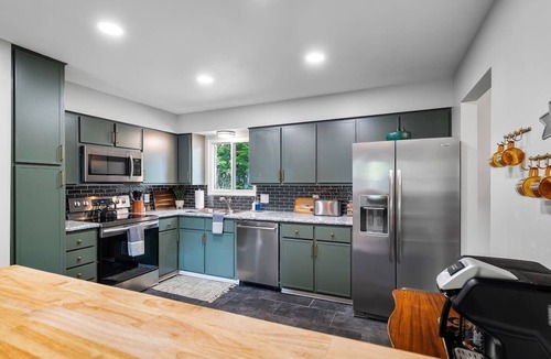 Northwest Akron House | Two Entire Homes with Hot Tubs and Games Sleeps 20