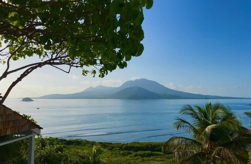 Frigate Bay Cottage | Two for One! Charming Cottage on hillside with private lounge on Turtle Beach!