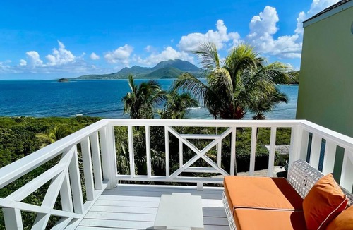 Frigate Bay Cottage | Two for One! Charming Cottage on hillside with private lounge on Turtle Beach!