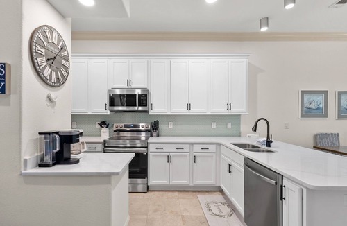 Villa Lago House | Two Golf Carts ~ Community Pool ~ Pet Friendly