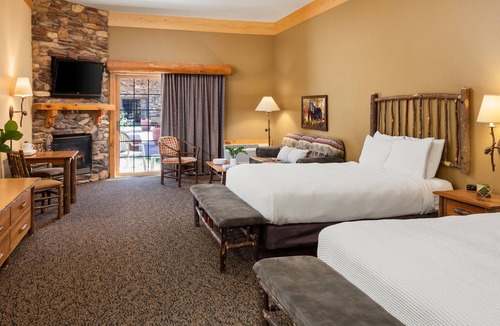 Rothschild Hotel | Two Queen Fireplace Suite With Kitchen, Access to Pool, Hot Tub, and Gym