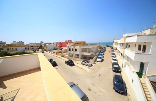 Torre Mozza Apartment | Two-room attic apartment with a view only 100 meters from Torre Mozza beach