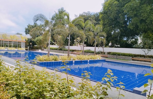 Guadalupe Apartment | Two separate studio units on the same floor of a midrise condominium building.