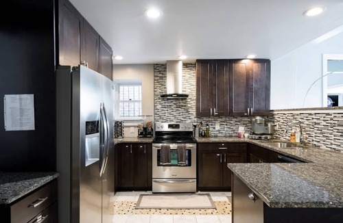 Downtown Wilmington Condo | Two-story condo in luxury townhouse. Free parking.