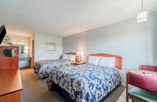 Aurora Hotel | Two Units, One Adventure: Walk to Local Shops, Enjoy Breakfast & Highway Access