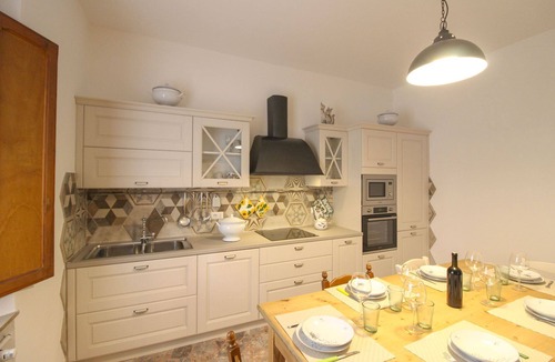Le Piazze Villa | Typical Tuscan house with private and fenced swimming pool. View on the village of Castiglion Fioren