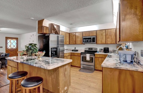 Eustis House | Uhost AI | Sleeps 15 Firepit Game Haven