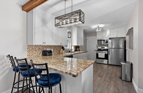 Richfield House | Ultimate Group Getaway: Sleeps 16, Hot Tub, Arcade, & 5 Min from Mall of America