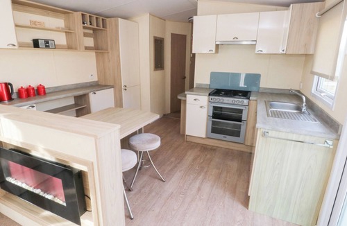Ferryside Cottage | UNDER CLIFF CARAVAN, family friendly, with pool in Ferryside