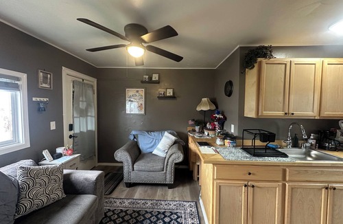 Russian Jack Park House | Unique 1 bedroom custom remodeled low energy foot print unit in private complex.