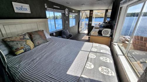 Brantingham Boat Rental | Unique Floating Home on Private Island for a Memorable Romantic Escape on Brantingham Lake, New York