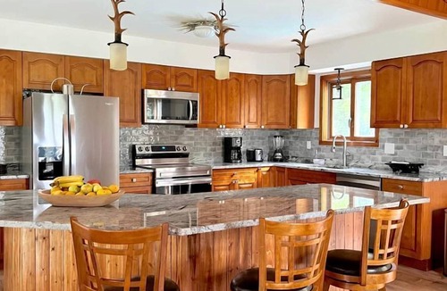 Johnsburg House | Unique Glamping Rental near Mt.Gore, New York, with Hot Tub, Heated Pool, and Playroom