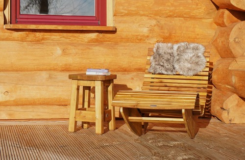 Den Oever Cottage | Unique log house for 6 pers. with terrace and unobstructed view near Wadden Sea