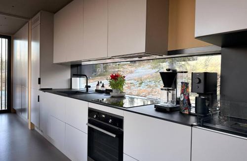 Flesberg House | Unique, modern cabin designed by Snhetta, located at Blefjell