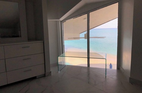 Seven Mile Beach Condo | Unique Oceanfront Condo on 7-Mile-Beach. Private Balcony. Cayman Reef Resort #30