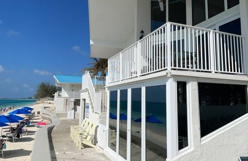Seven Mile Beach Condo | Unique Oceanfront Condo on 7-Mile-Beach with Patio. Cayman Reef Resort # 22