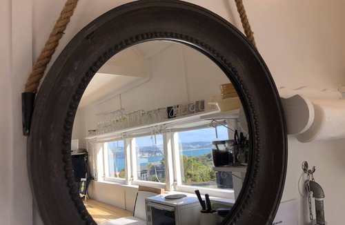 Whitianga Cottage | Unique Tiny homes with fabulous sea views and cosy internal courtyard.