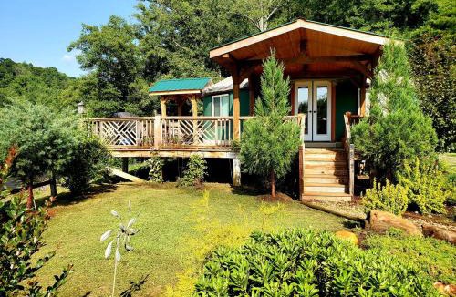 Clyde House | Unique Yurt Rental on Peony Farm with Riverfront View in Clyde, North Carolina