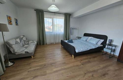 Saftica Apartment | Uniria Studio Balotești Near Therme and Otopeni Airport Free Private Parking