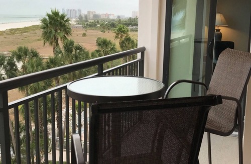 Sand Key Condo | Unit 502 2 waterfront balconies! Expansive white sand beach Harbor Light Tower