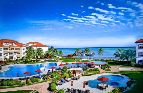 San Pedro Condo | UNRIVALED VIEWS from DESIGNER RENOVATED PENTHOUSE, Top 3BR rental @ GRAND CARIBE