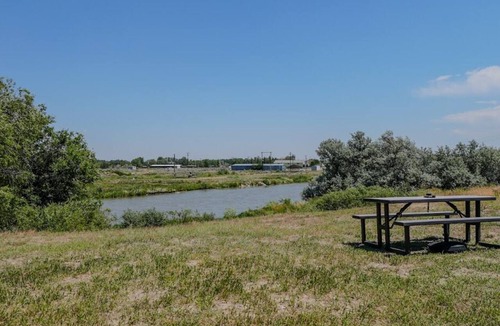 Casper House | Unwind at this cozy riverfront retreat with scenic views and a quiet setting. Perfect for a comfortable stay close to town, outdoor activities, and local amenities.