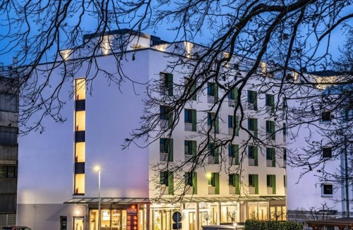 Korntal-Munchigan Hotel | Unwind in a Modern Room Great for Weekend Stay Near Zoo Wilhelma - 6.1 miles