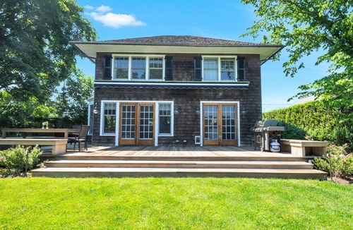 Village of East Hampton House | Upbeat traditional-style home with a private pool, open-floor plan, pool...