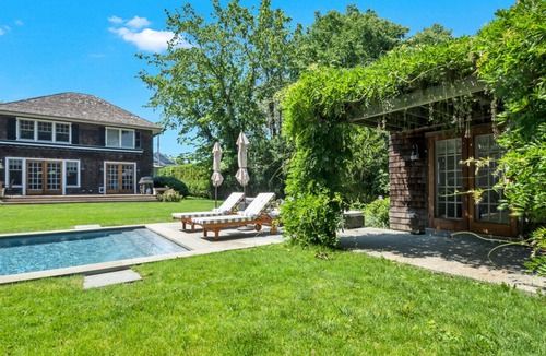 Village of East Hampton House | Upbeat traditional-style home with a private pool, open-floor plan, pool...