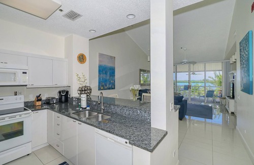 Whitney Beach Condo | Updated 2B/2B with a beautiful view of the bay right from the patio!