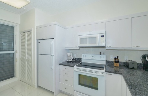 Whitney Beach Condo | Updated 2B/2B with a beautiful view of the bay right from the patio!