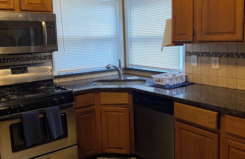 Redford House | Updated brick ranch with lots of space.