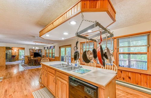 McHenry Cabin | Updated cabin with wraparound deck & forest view - dog-friendly