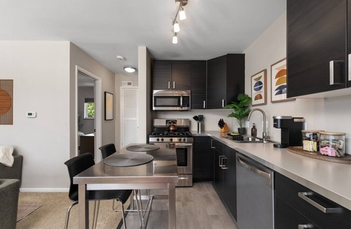 Grandview Heights Apartment | Updated flat with parking and laundry in an exceptional location