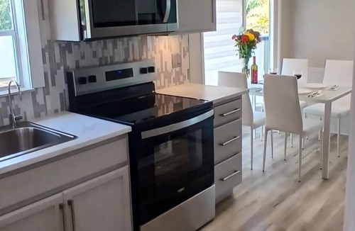 Braden River House | Updated Lakefront Home with Private Trail & Golf Cart