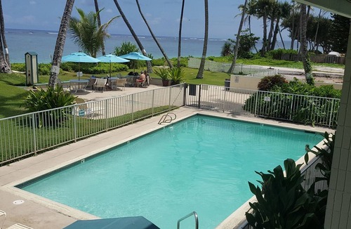 Punaluu Condo | Updated Oceanfront Condo! Long clean beaches to walk & swim! Escape the Crowds!