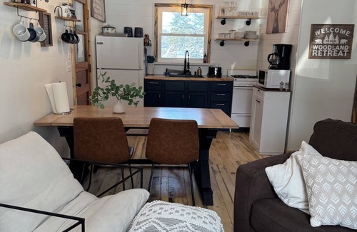Tomahawk Cabin | Updated Private wooded cottage on the River with hot tub & sauna & pool table!