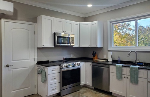 Elizabethton Apartment | Updated Retro Retreat + Patio/Grill - 5 Min Walk to Town