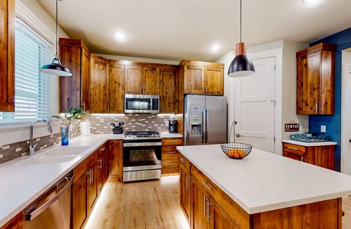 Cedar City House | Updated townhome with ensuite bedrooms, workstation, & aquatic center pass