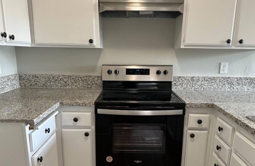 Roosevelt House | Upper level unit with one bedroom and one bathroom and fresh interior paint