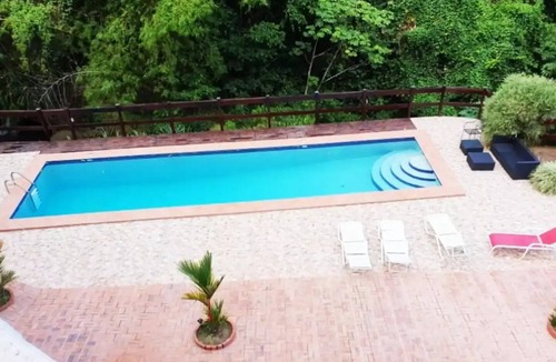 Soufriere Apartment | Upper studio 1 River backdrop