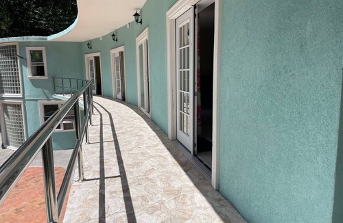 Soufriere Apartment | Upper studio 1 River backdrop