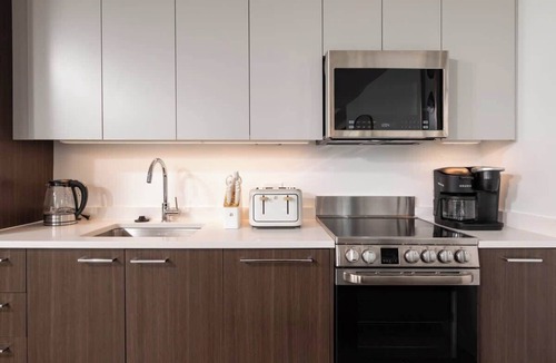 Central Square Apartment | Upscale 1BR MIT Harvard WiFi Gym W D Parking!