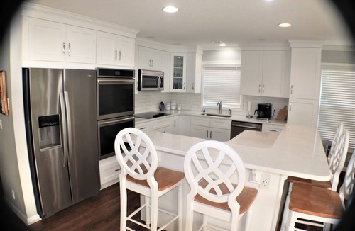 Ocean Isle Beach House | Upscale 6 Bedroom Canal Waterfront, Private Pool, Golf Cart, Kayaks, Bikes- WOW